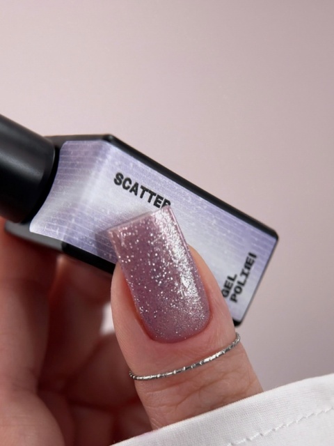BIBLIOTEKA Cat Eye Gel Polish 31 Scatter, 10 ml - jasny srebrno-fioletowy lakier hybrydowy z efektem „kociego oka"